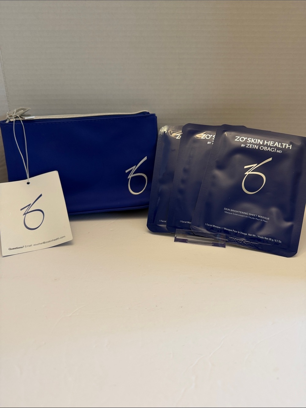 Navy Toiletry Bag with Branded Skincare Sachets